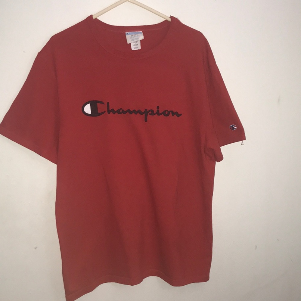 Red champion t-shirt .